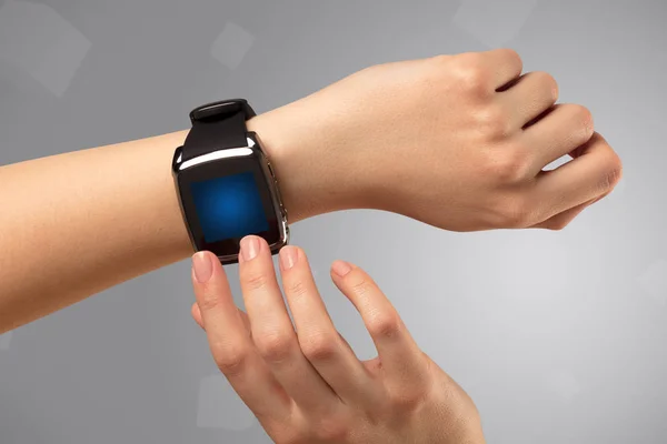 Female hand wearing smartwatch — Stock Photo, Image