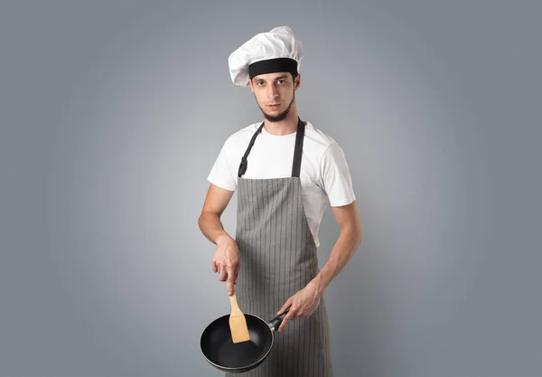 Koken met keukengerei en lege behang — Stockfoto