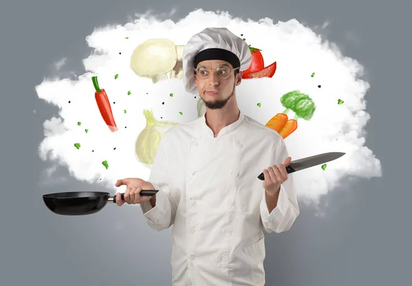 Vegetables on cloud with male cook