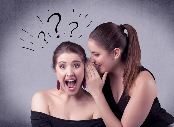 Girl telling secret things to her girlfriend — Stock Photo, Image