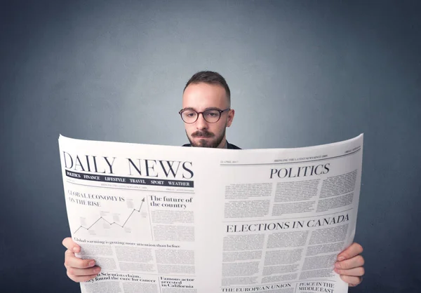 Businessman reading newspaper — Stock Photo, Image