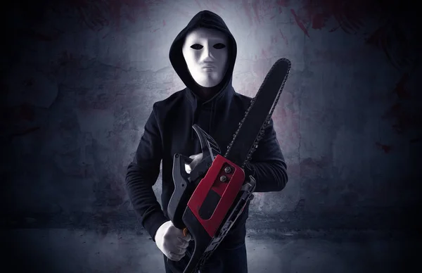 Armed assassin in an empty bloody room concept — Stock Photo, Image