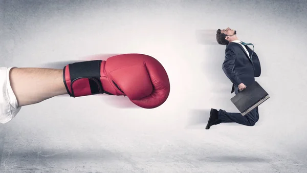 Empresário é demitido por uma enorme mão de boxe — Fotografia de Stock