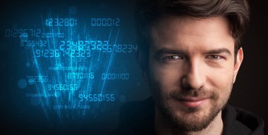 Koyu arka plan üzerinde genç bir işadamı portresi