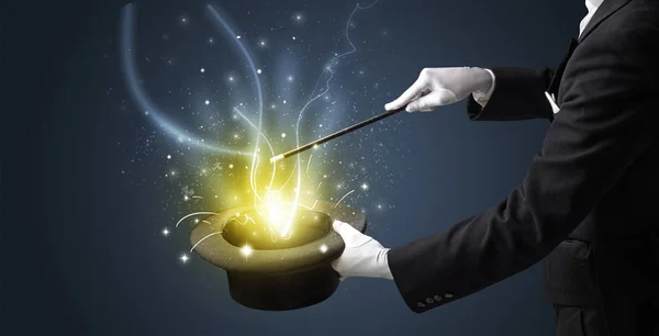 Magician hand conjure miracle from cylinder — Stock Photo, Image