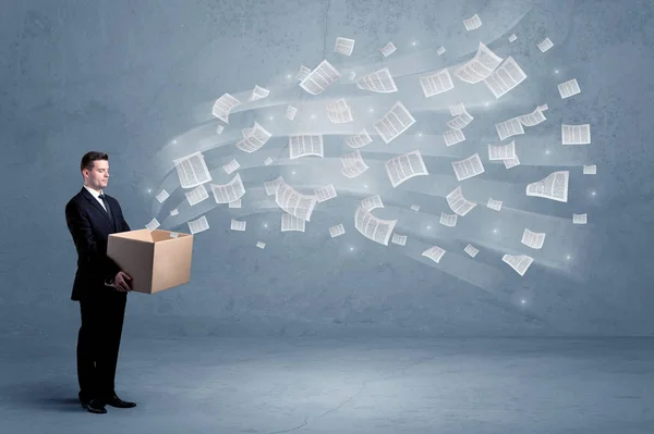 Business papers flying from box — Stock Photo, Image