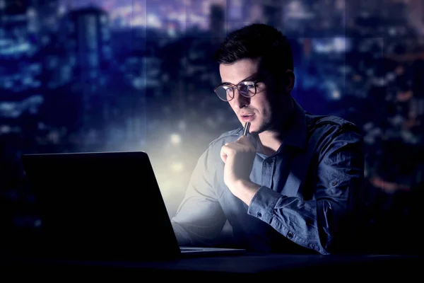 Businessman in the office at night — Stock Photo, Image