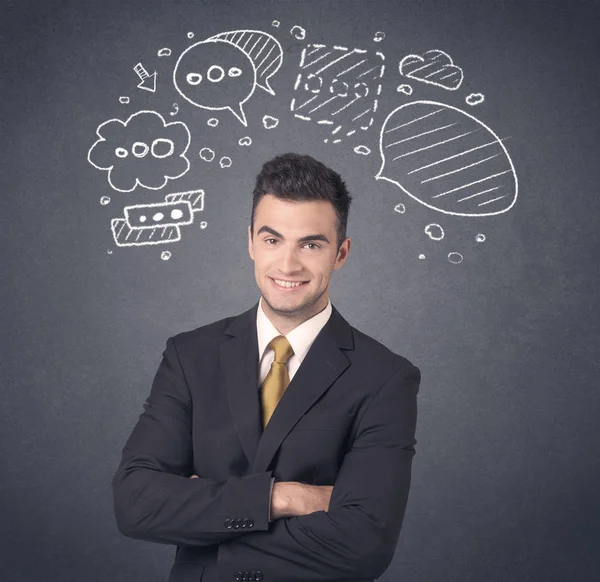 Hombre de negocios con burbujas de habla — Foto de Stock