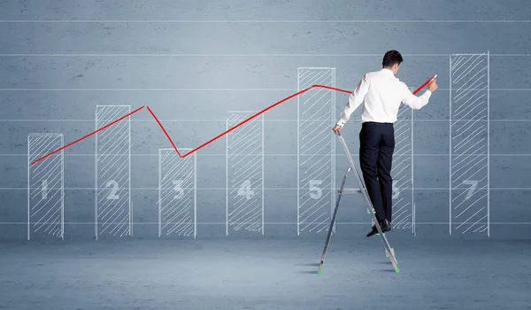 Man drawing chart from ladder — Stock Photo, Image