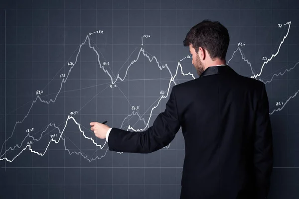 Affärsman med diagram — Stockfoto