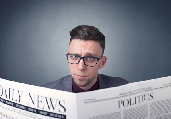 Businessman reading newspaper — Stock Photo, Image