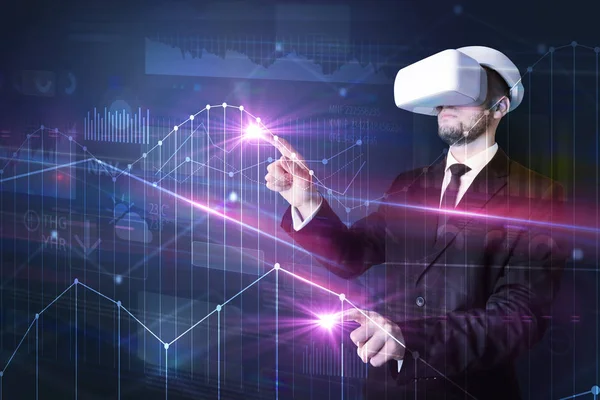 Man standing with VR goggles and graphs charts — Stock Photo, Image