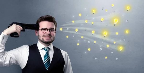 Handsome man shooting himself with gun — Stock Photo, Image