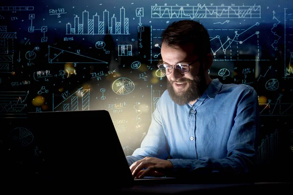 Businessman in the office at night — Stock Photo, Image