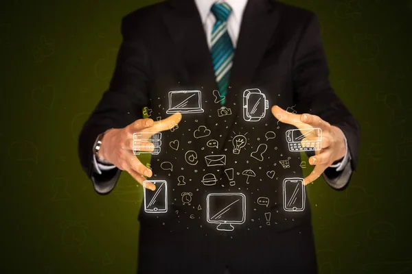 Businessman holding networking icons — Stock Photo, Image