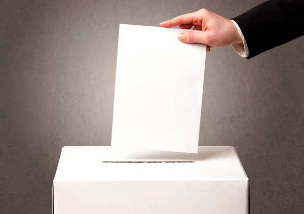 Ballot box with person casting vote — Stock Photo, Image