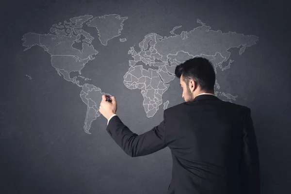 Businessman with world map