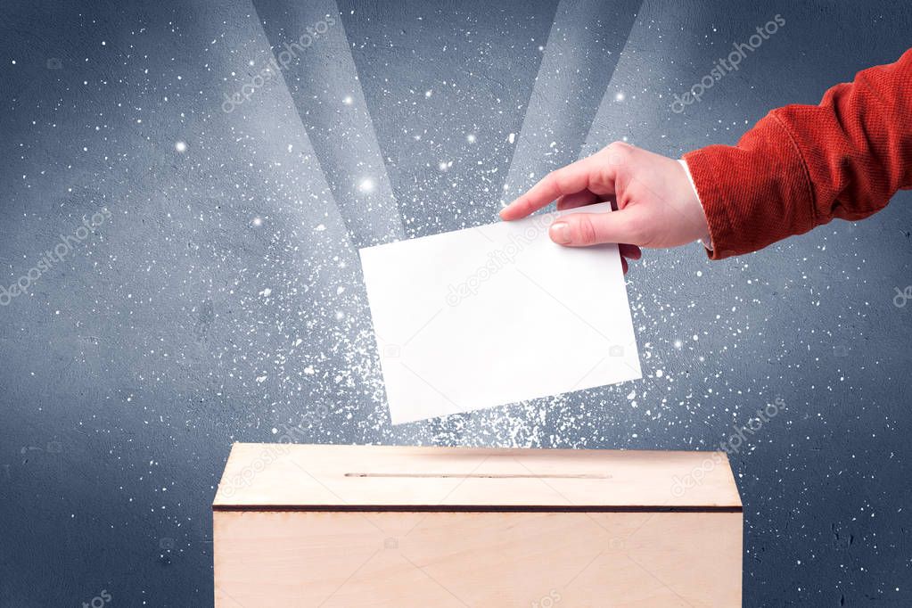 Ballot box with person casting vote