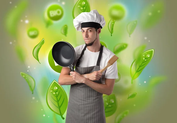 Bio bladeren concept en cook portret — Stockfoto