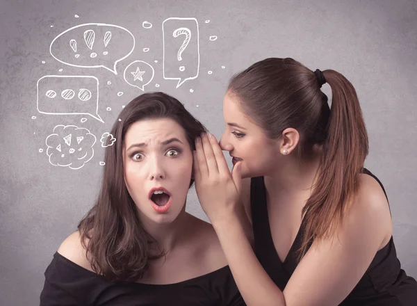 Girl telling secret things to her girlfriend — Stock Photo, Image