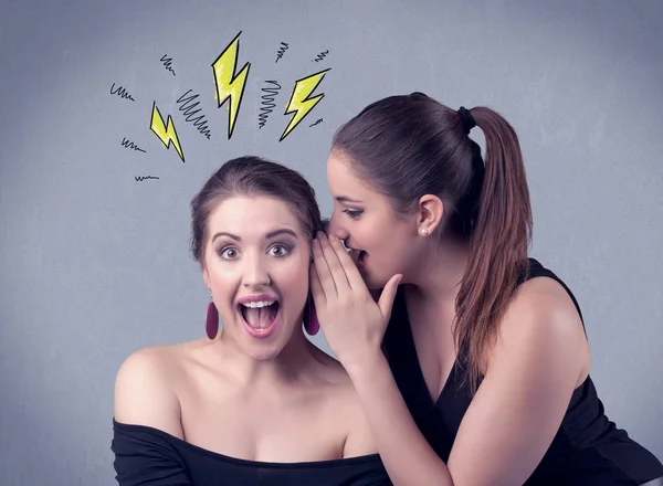 Girl telling secret things to her girlfriend — Stock Photo, Image