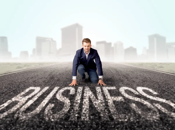 Businessman at start line — Stock Photo, Image