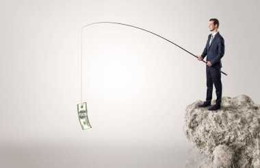 İşadamı Balık tutma Doları bir rock