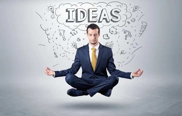 Affärsman mediterar med doodle koncept — Stockfoto