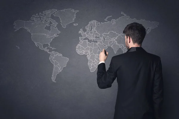 Businessman with world map