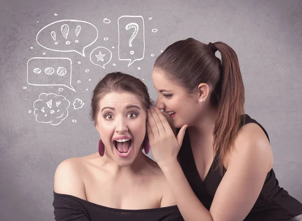 Girl telling secret things to her girlfriend — Stock Photo, Image