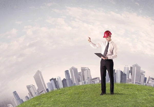 man standing in front of city landscape