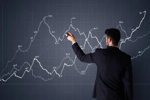 Affärsman med diagram — Stockfoto