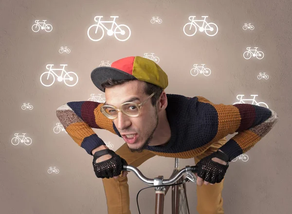 Lunatic cyklist med cykel på bakgrunden — Stockfoto