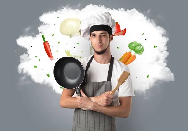 Légumes sur nuage avec cuisinier masculin — Photo