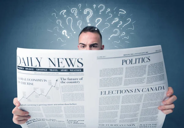 Businessman reading newspaper — Stock Photo, Image