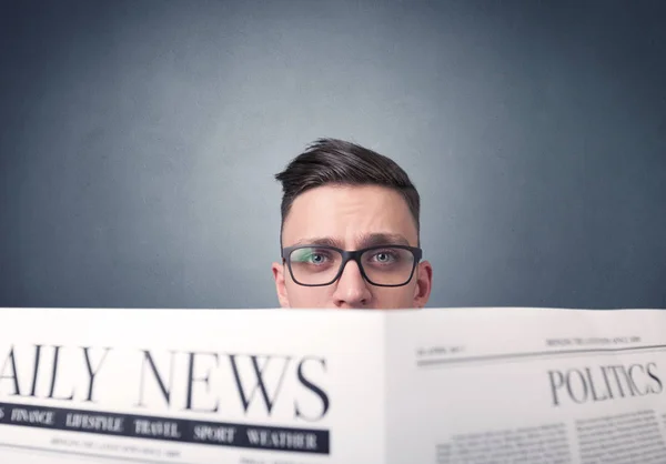 Businessman reading newspaper — Stock Photo, Image