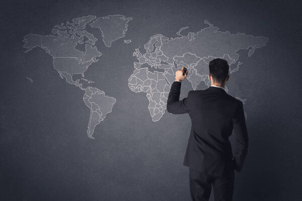 бизнесмен с картой мира