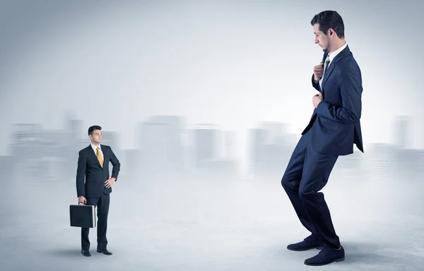 Giant businessman is  afraid of small executor — Stock Photo, Image