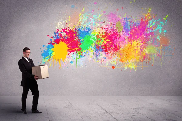 Colour splatter from box — Stock Photo, Image