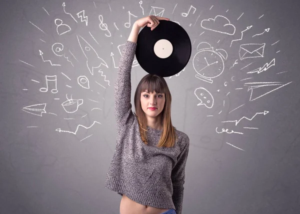 Senhora segurando recorde de vinil — Fotografia de Stock