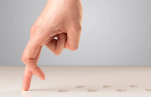 Walking fingers on white surface — Stock Photo, Image