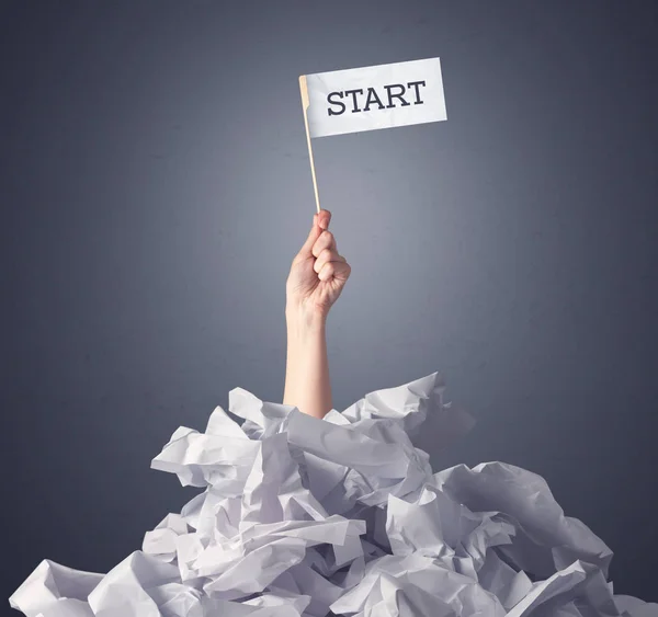 Female hand holding start sign — Stock Photo, Image