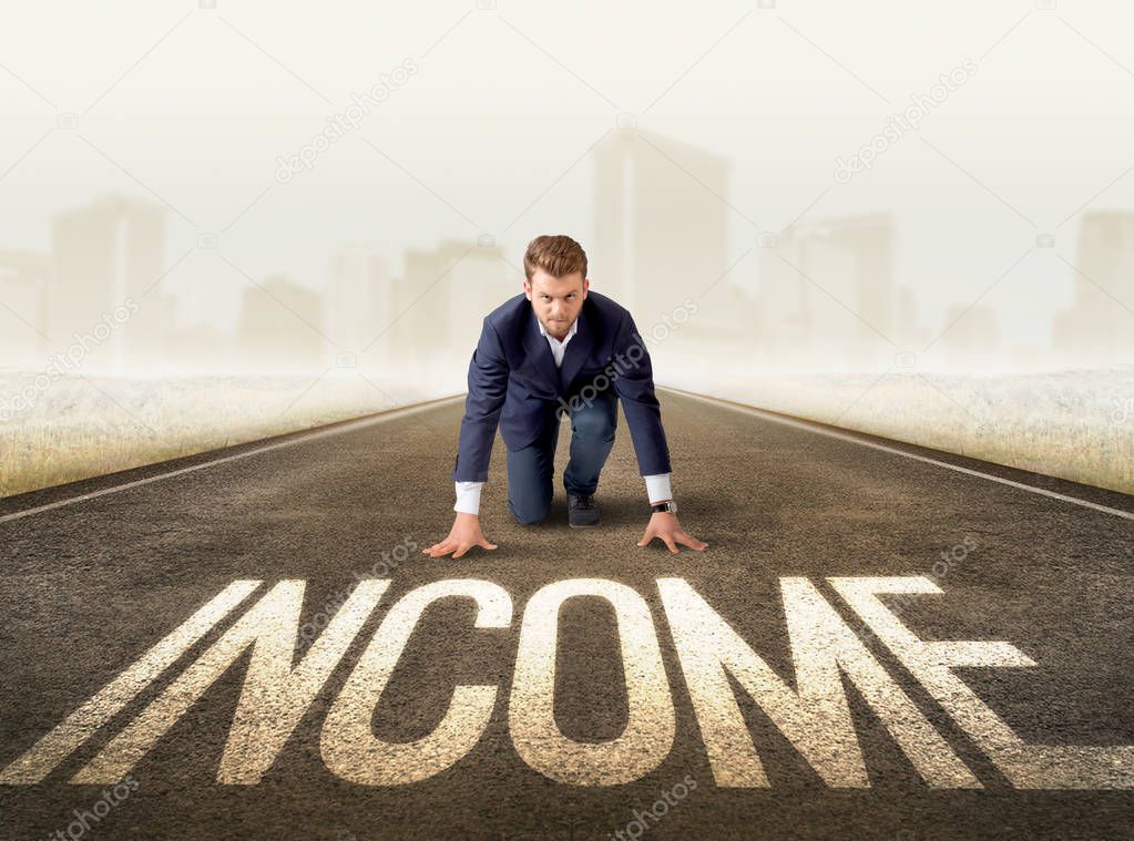 Businessman kneeling in ready position