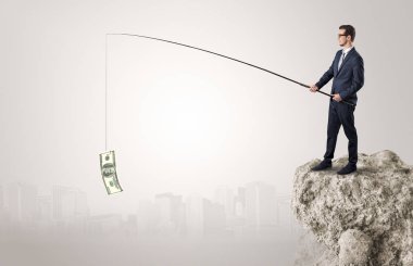 İşadamı Balık tutma Doları bir rock