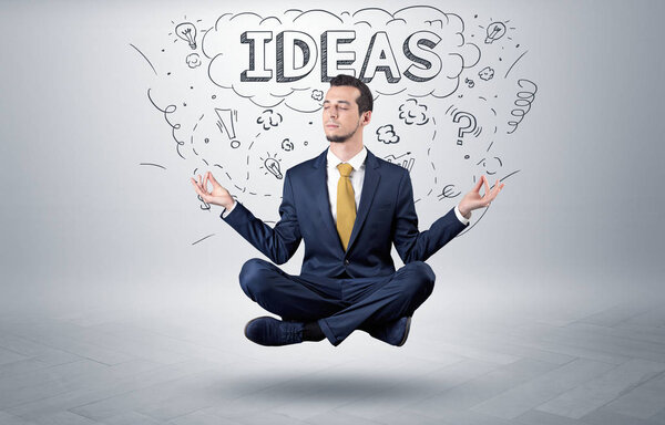 Бизнесмен медитирует с помощью каракулей
