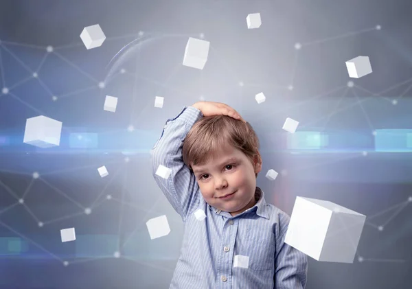 Cute kid with luminous cubes around — Stock Photo, Image