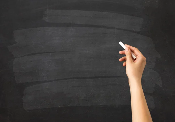 Hand holding chalk — Stock Photo, Image