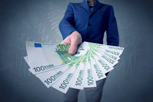 Businessman holding money — Stock Photo, Image