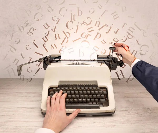 First person perspective elegant hand typing with flying letters concept — Stock Photo, Image