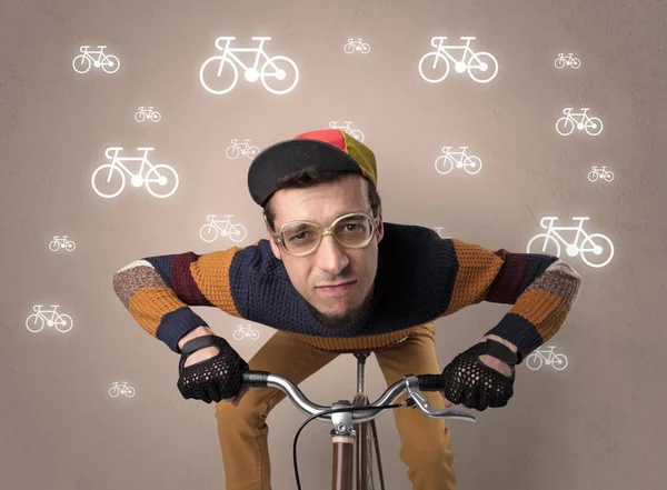 Lunatic rowerzysta z rowerem na tle — Zdjęcie stockowe